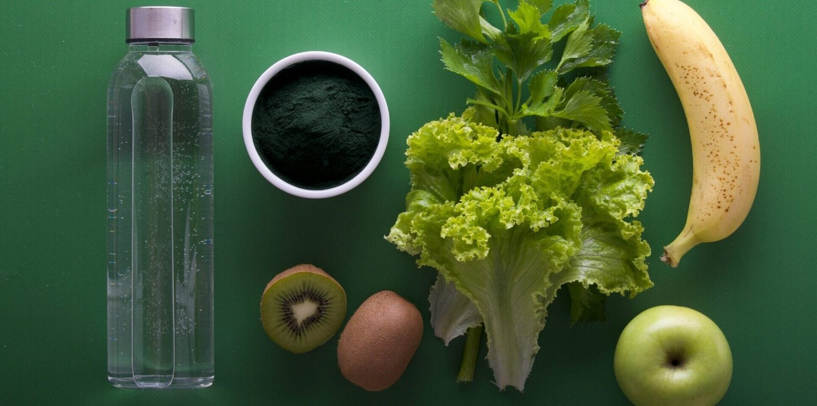 assorted fruits and vegetables on green surface
